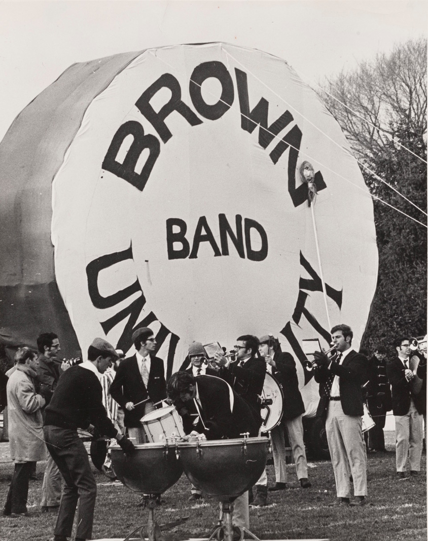 Brown Band stands next to massive bass drum