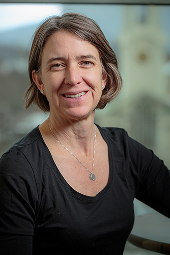 headshot of Jane Dietze in black shirt 