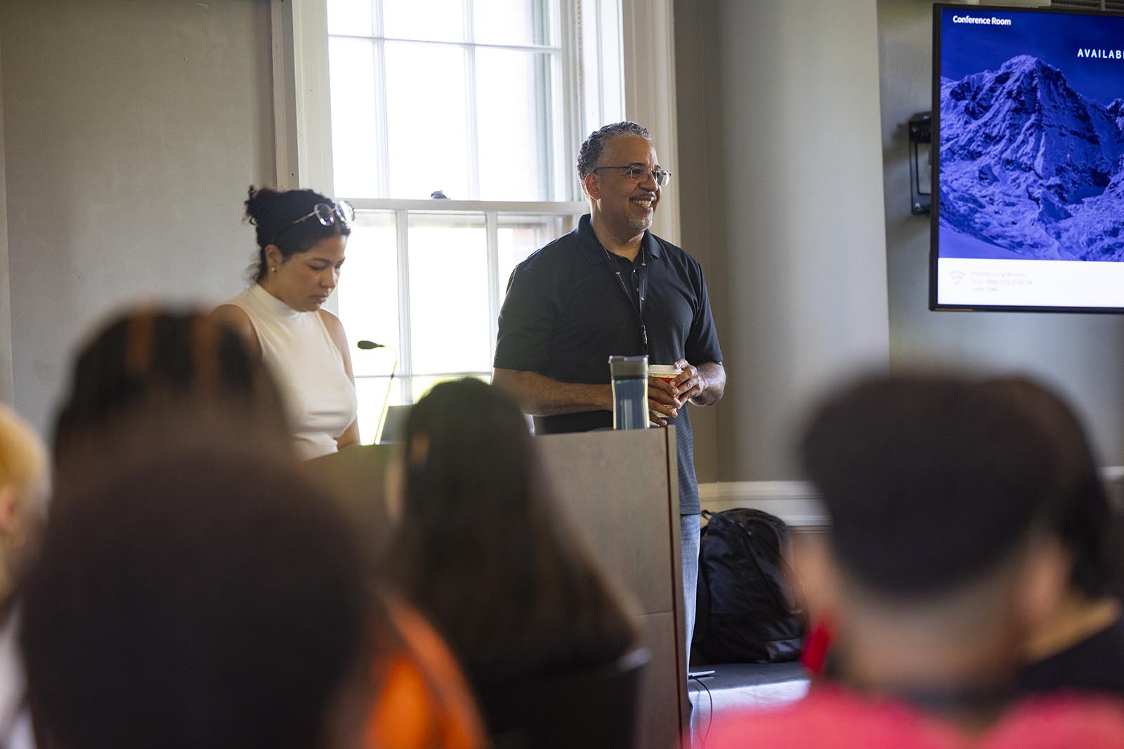 Program director leads a morning session to kick off the day 