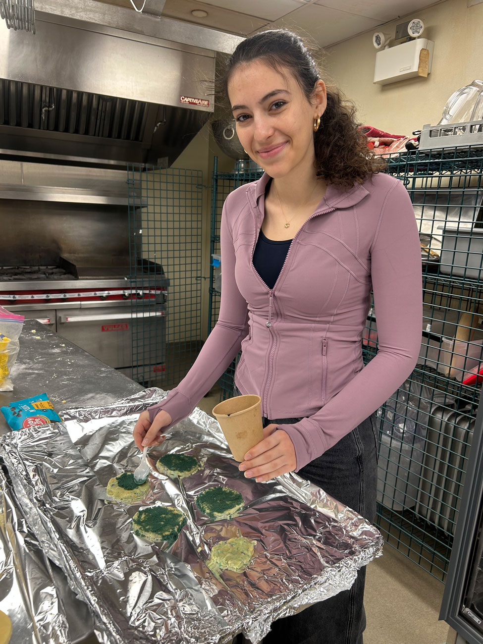 Eliza Tabachnik decorates sugar cookies