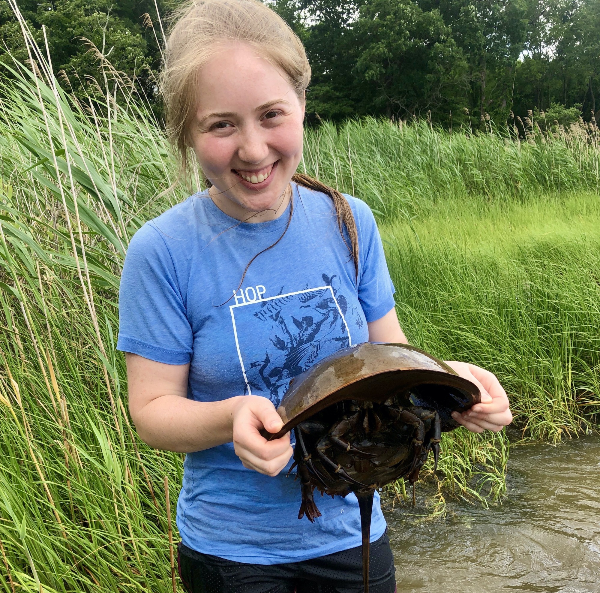 Caroline holds a turtle 