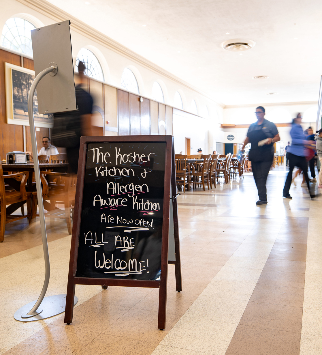 A sign marks the opening of the new kitchen spaces