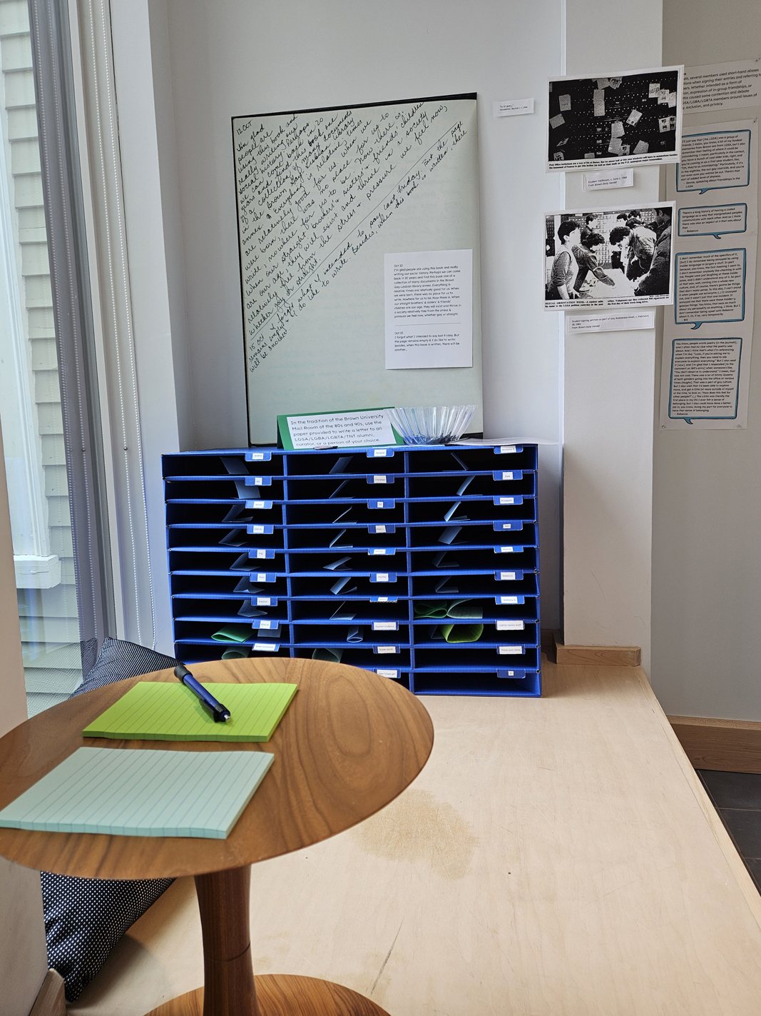 Part of the exhibit shows mock mailboxes, writing area