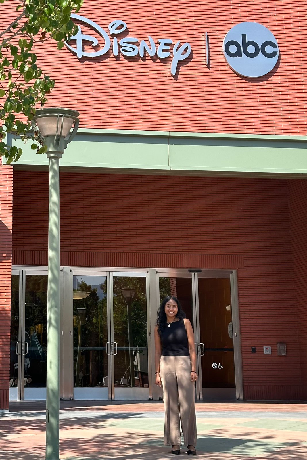 Maiya stands outside Disney ABC studios