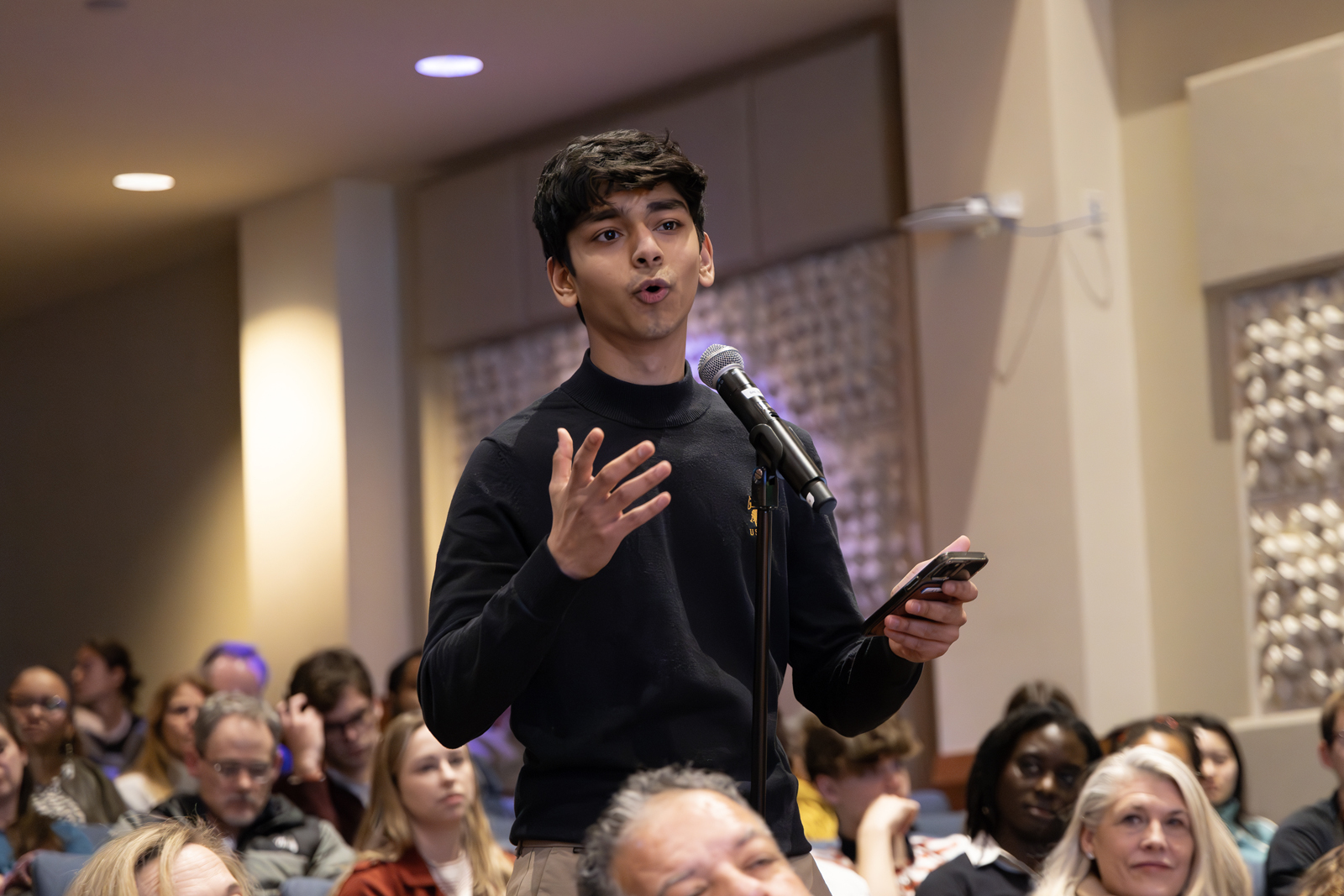 Student asks question during Q&A session