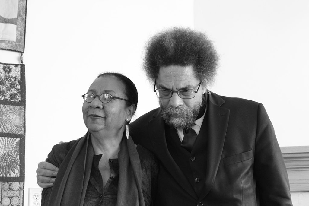 Cornel West embracing bell hooks 