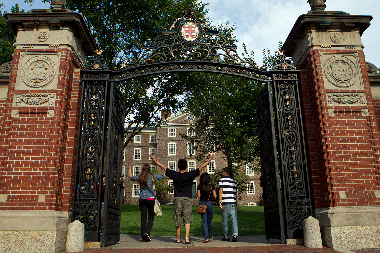 Students walking through the Van Wickle gates