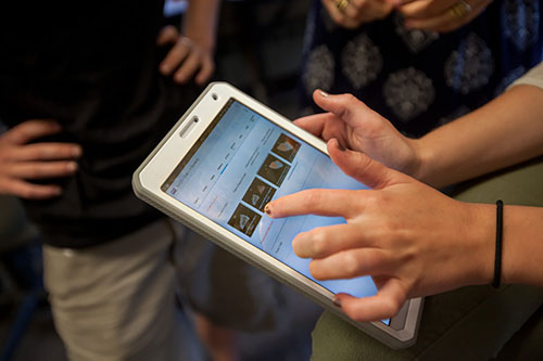 Group looking at a tablet