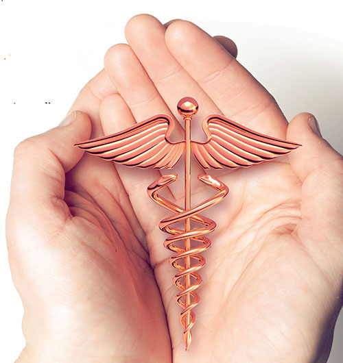 Hands holding a caduceus