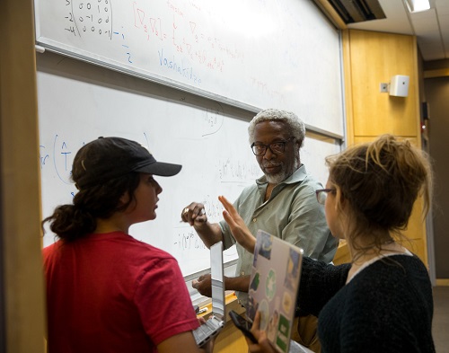 Gates teaching a class