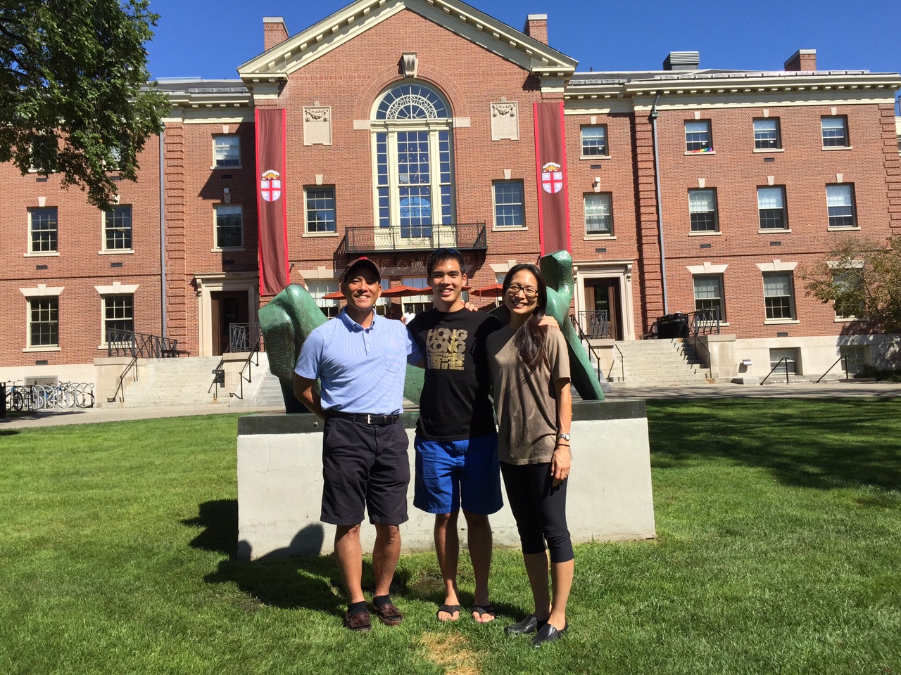 Kiyo Kuwana posing on the main green with his parents