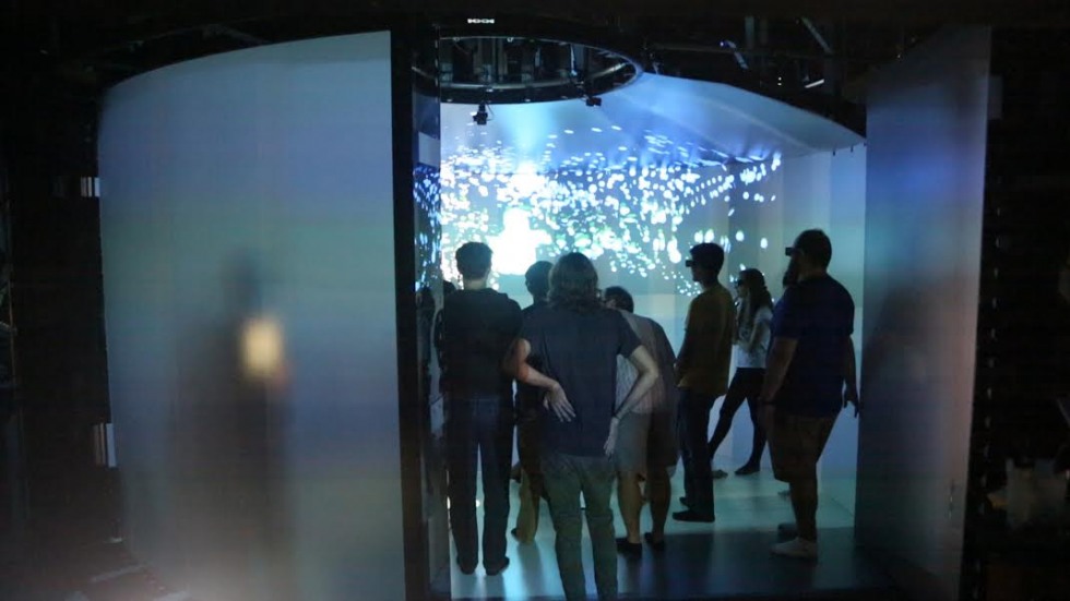 Students using virtual reality goggles inside the YURT theater