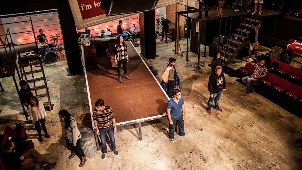 Students on stage during a production