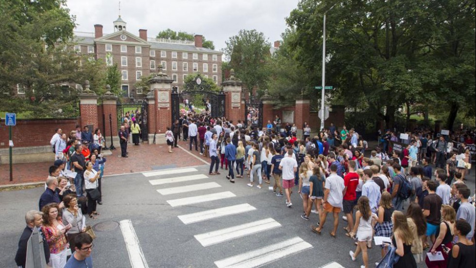 Students marching through the gates