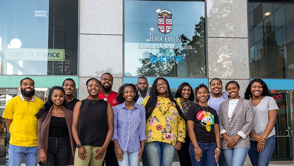 Health Equity Scholars at Brown posing in front of the School of Public Health