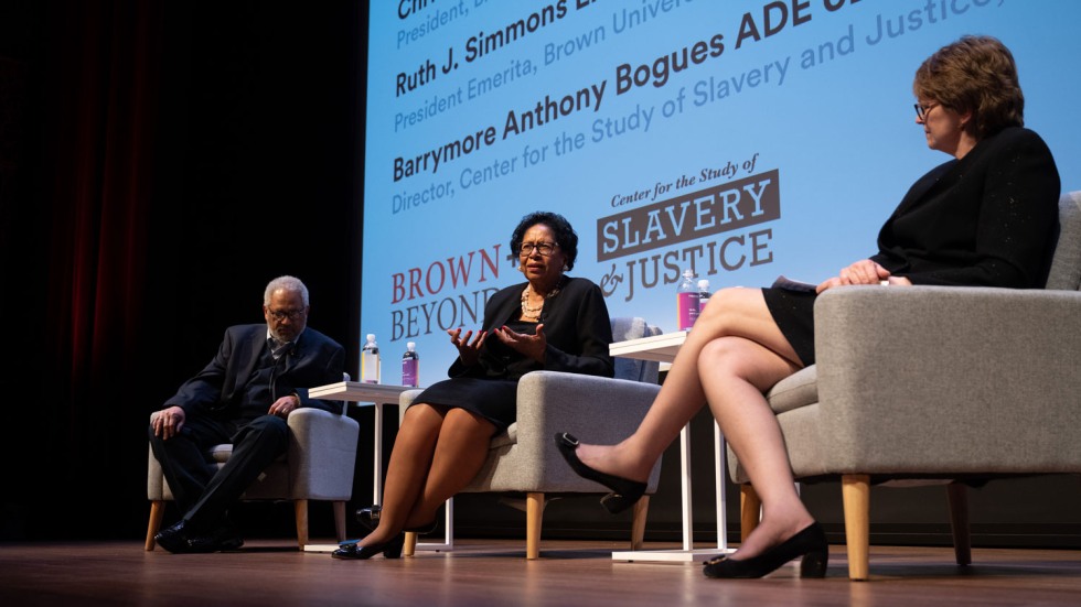 Tony Bogues, Ruth Simmons and Christina Paxson having a seated conversation on a stage