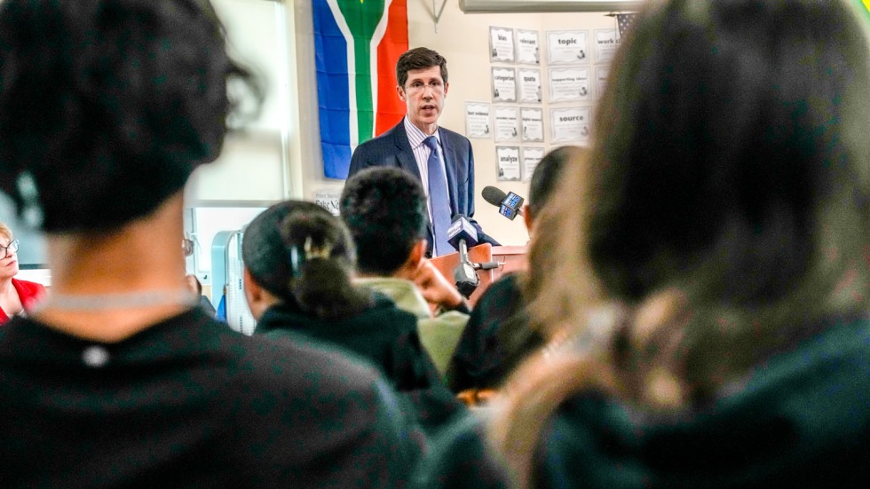 Mayor Brett Smiley speaking to high school students from a podium