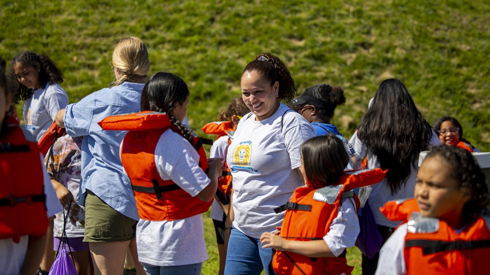 Swearer Center staff member Dilania with D'Abate students 