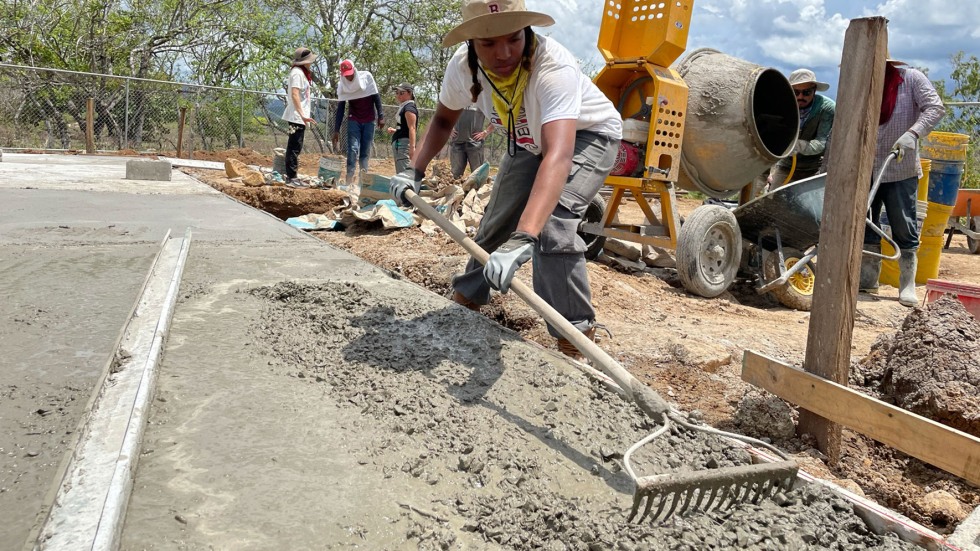 Student helps build a sports court in Panama