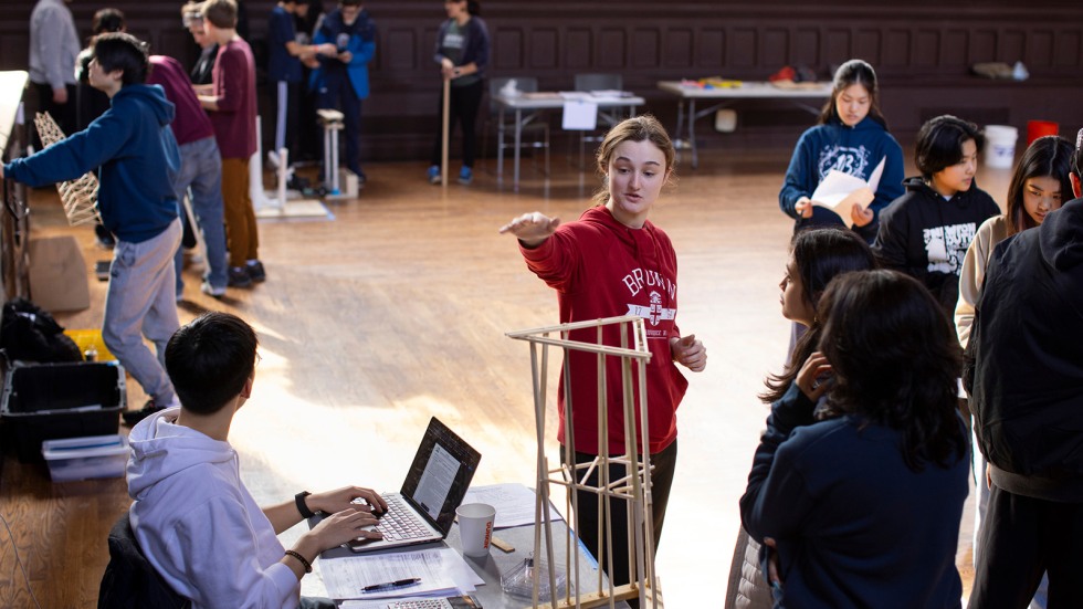 Brown students directing participants 