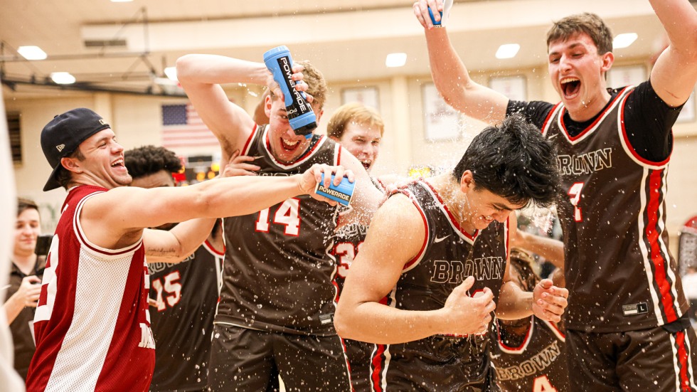 teammates throw gatorade on kimo ferrari in celebration