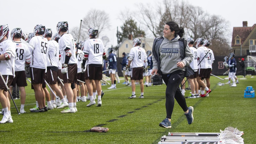 Providence high schooler taking photos of Men's Lacrosse team at Brown