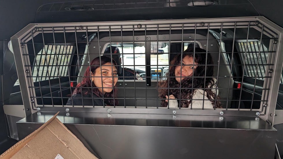 Met students in a police car for a ride along 