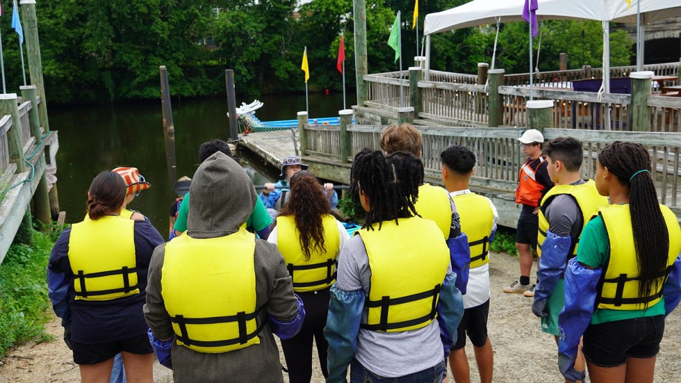 students prepare to kayak