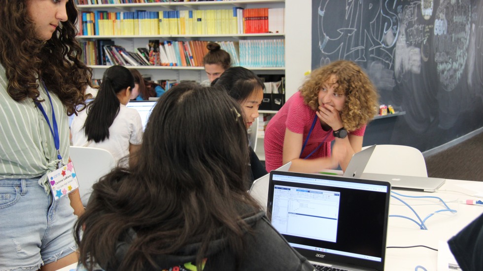 Students working at a computer