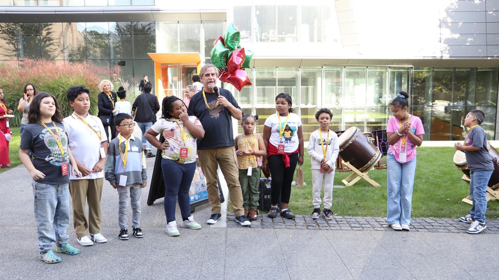 kids join teacher at celebration event 