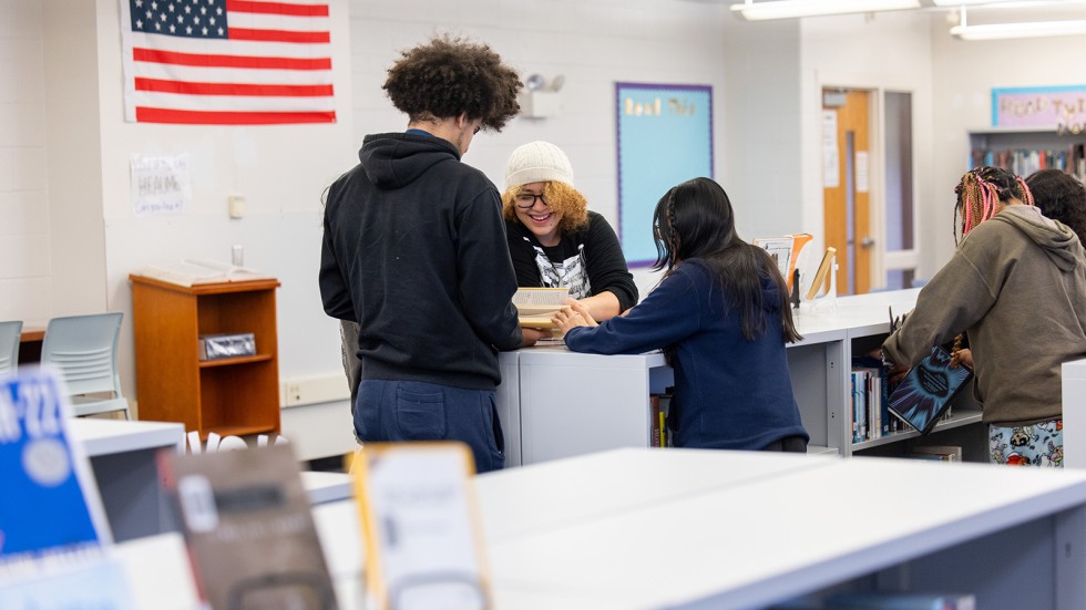 students enjoy new library spaces, look for books