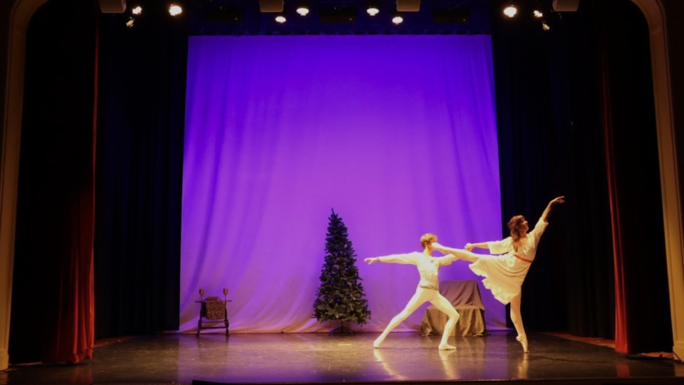 Clara and the Nutcracker dance in a scene 