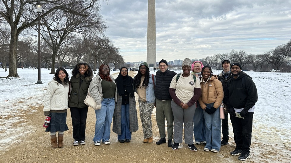 students and staff in front of Washington Monument 