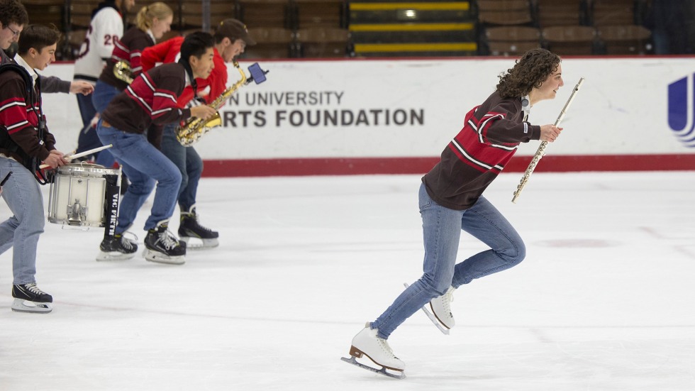 Flautist skates ahead of band 