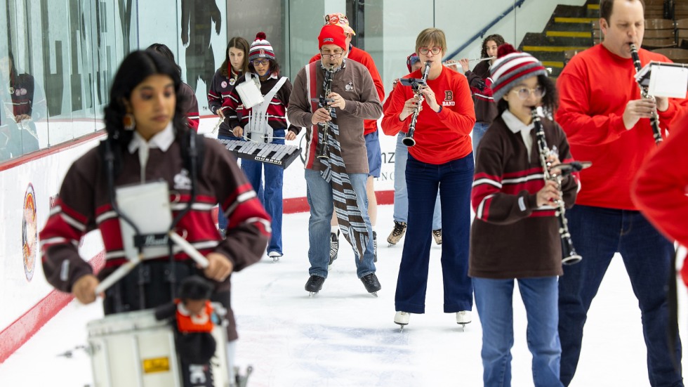 Band members skate on ice